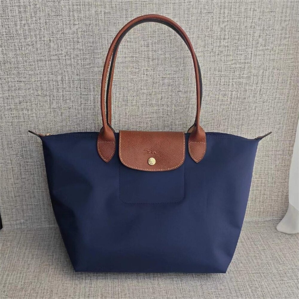 Brand new navy blue Medium Longchamp women's canvas bag.